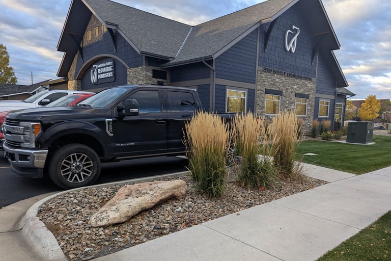 a truck parked in front of a house