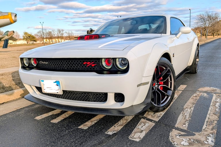 Thanks to John from Illinois for sending pictures of this beautiful car with the vintage red bezels