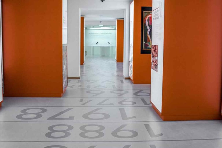 Custom Designed Stamped Concrete Gray Office Floor with Dark Orange Walls