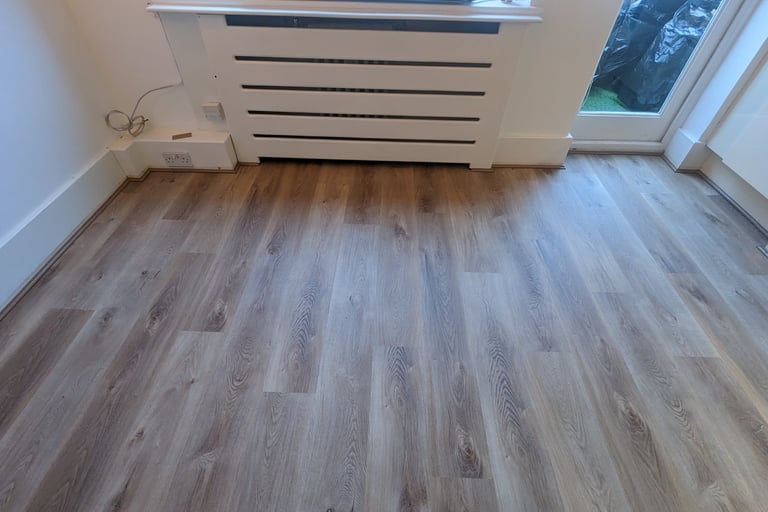 Engineered wood flooring installed by Pro Fittings Ltd in East Village, Stratford