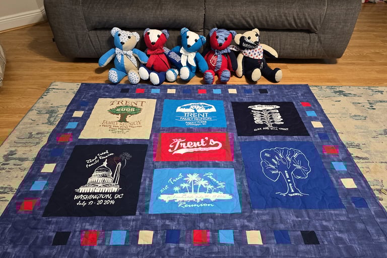 Memory quilt made from clothing shown with handmade memory teddy bears created from the same garment