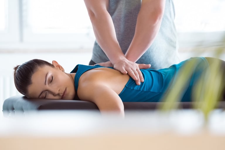 a woman is shown getting a therapeutic massage