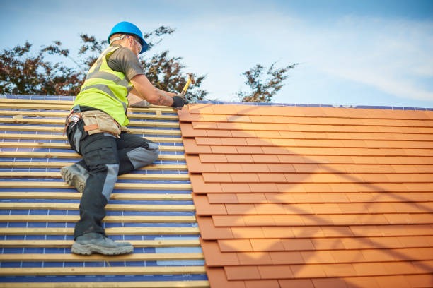 man installing a new orange roof