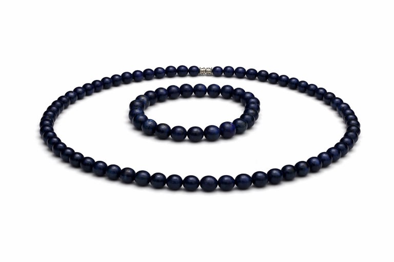 lapis lazuli necklace and bracelet set with deep blue natural stones, elegant jewelry for truth, clarity, and self-expression