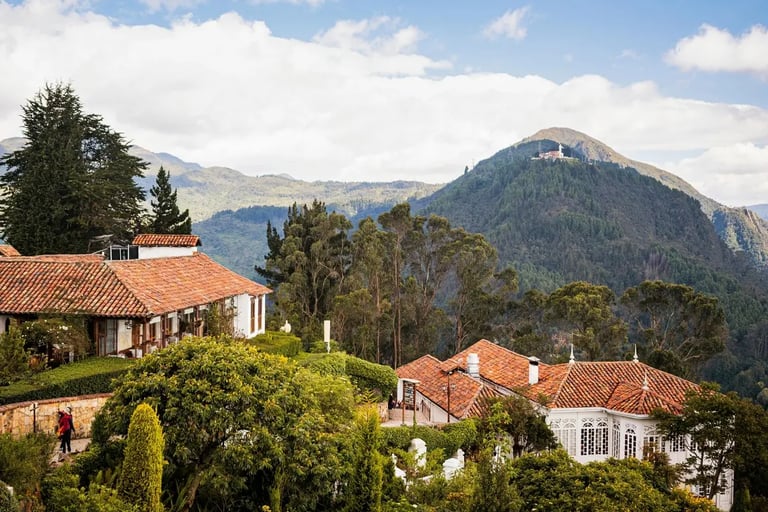Panoramic view of lush green Andean mountains from the top of Monserrate during a private nature tour