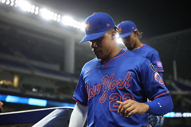 April 1 NY Mets Juan Soto (22) and Francisco Lindor enter the dugout in between innings during a game vs. Marlins