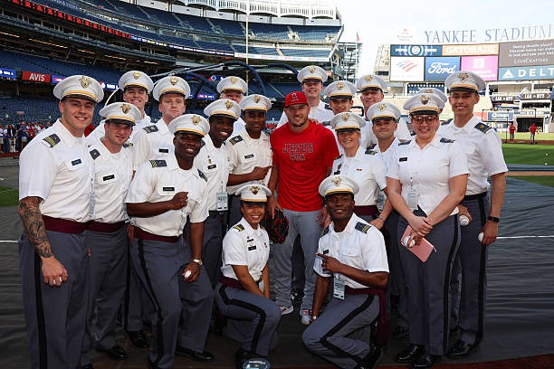 Apr 14 Mike Trout of the L.A. Angels & U.S. Military Academy cadets pose for a photo before game between the Angels & Yankees