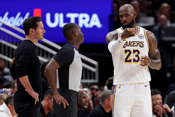 JJ Redick, Referee James Williams, and LeBron James during Game 4 of the Lakers-Rockets Round 1 Series