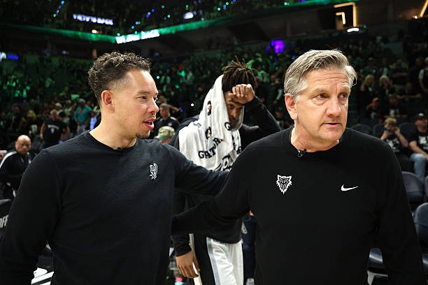 Mitch Johnson and Chris Finch, head coaches of the Spurs and Timberwolves, during game 6 (May 15, 2026)