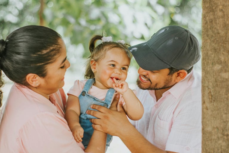 Hispanic family with little toddler