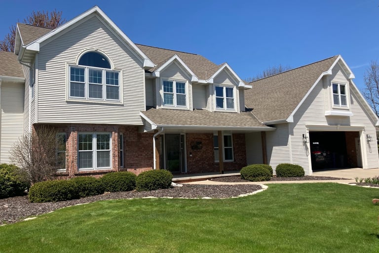 House washing in Ashwaubenon WI by Peak Pro Wash