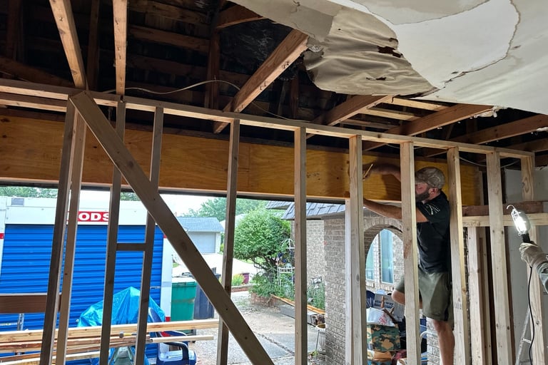 Structural beam replacement during home repair project