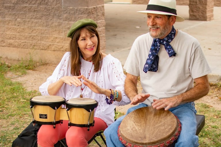 Jerry and Victoria drumming with heart at Himmel Park Drum Circle in Tucson, Arizona