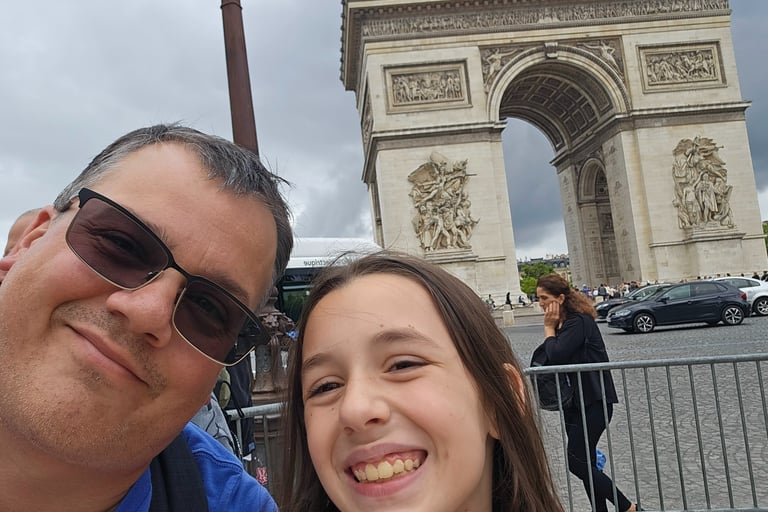 Ben and his lovely assistant at the Arc de Triomphe, Paris.