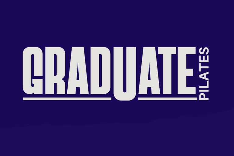 Official Graduate Pilates studio logo featuring bold white serif typography on a deep purple background.