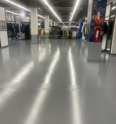 A retail store with a polished concrete floor. 