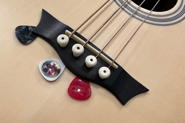 pick holder acoustic guitar bridge