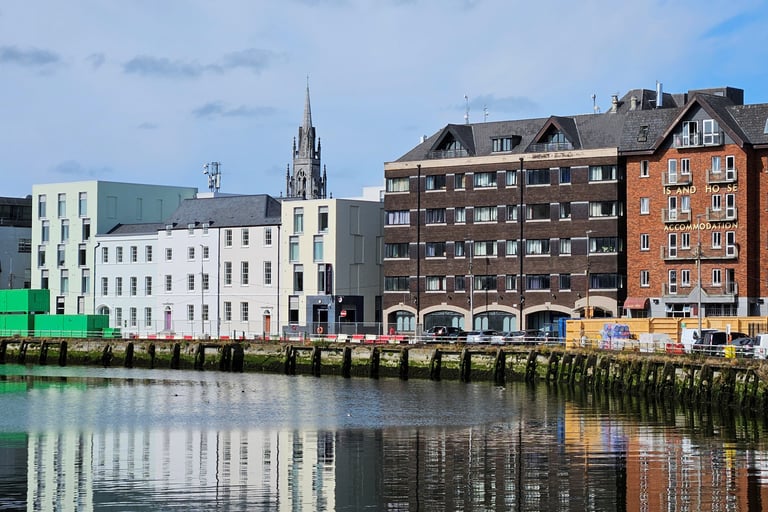 The Premier Inn entrance is below the spire
