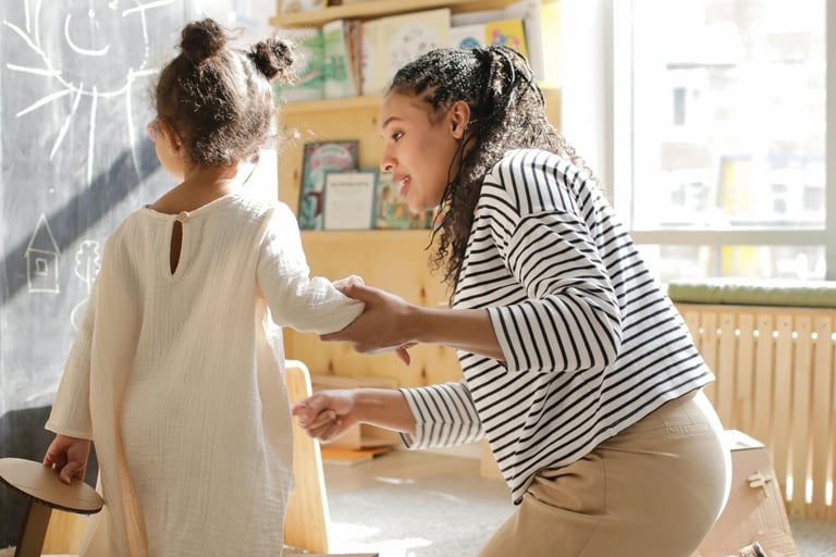 Nursery class home tutor teaching kids with activity-based learning at home