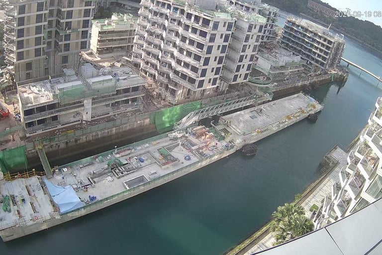 a large building with a large body of water