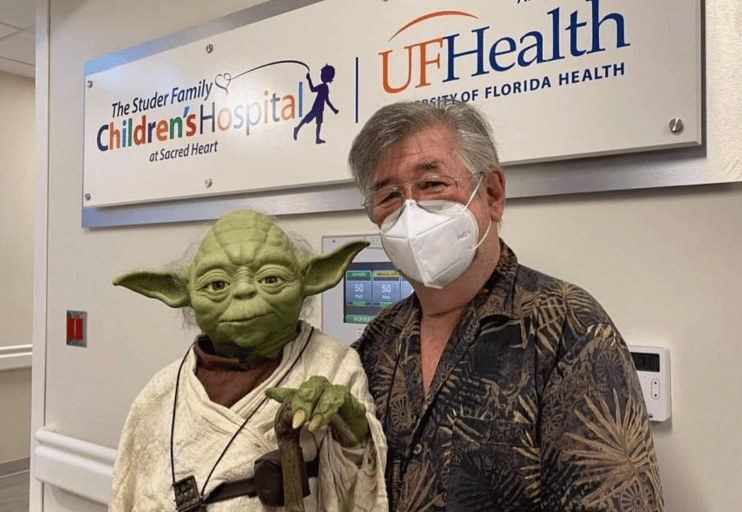 Founder of The Force for Good, "Yoda Guy" Nick Maley takes Yoda to uplift kids in cancer ward.