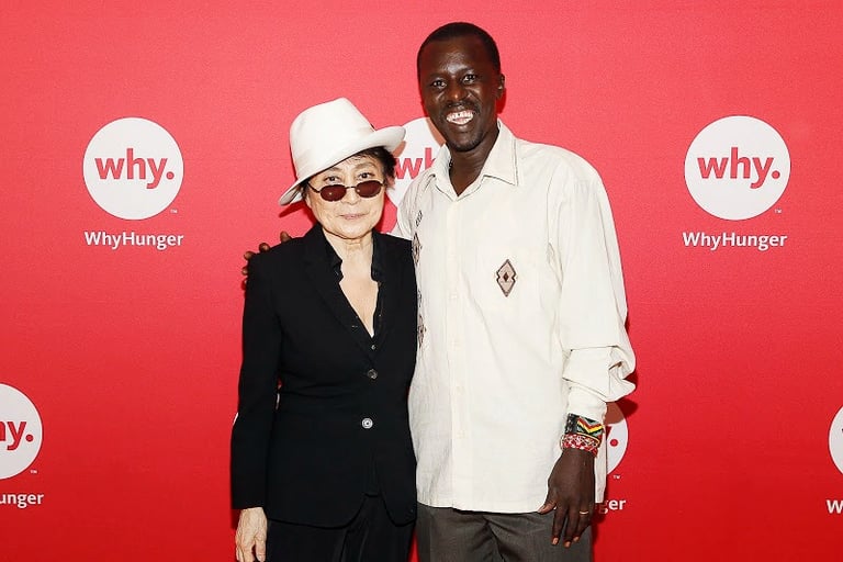 CEA Hope North Founder Okello Sam with Yoko Ono.