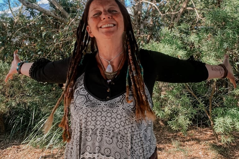 a happy woman with dreadlocks