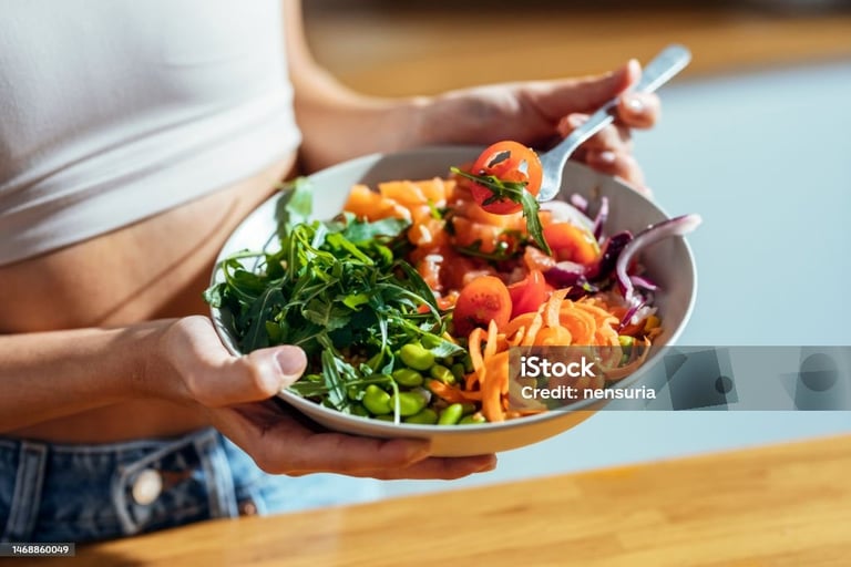 a young lady eating healthy food