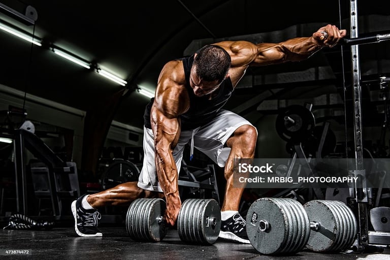 a man holding a dumbbell