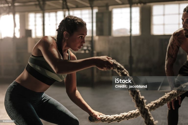 a man and woman doing a rope 