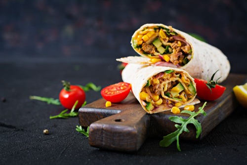 a burrito with a burrito and vegetables