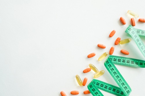 a measuring tape and supplements