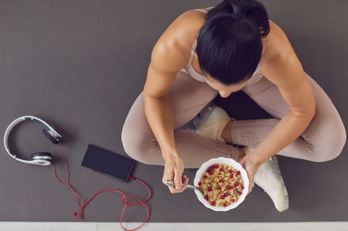 a woman eating breakfast