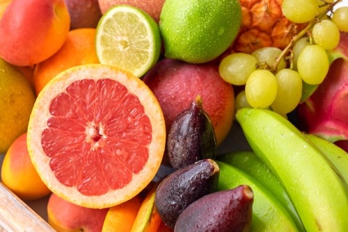 a bunch of fruit and vegetables in a basket