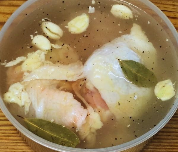 chicken in brine with bayleaves for pulled chicken