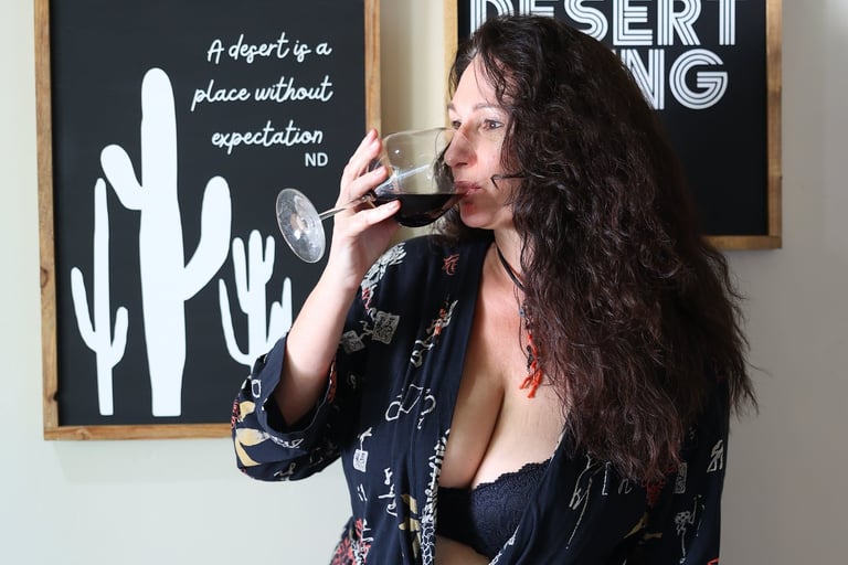 photo of Jennadea drinking wine