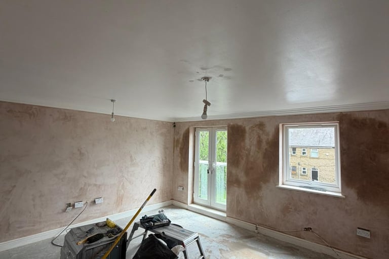 Walls plastered ready for decoration.