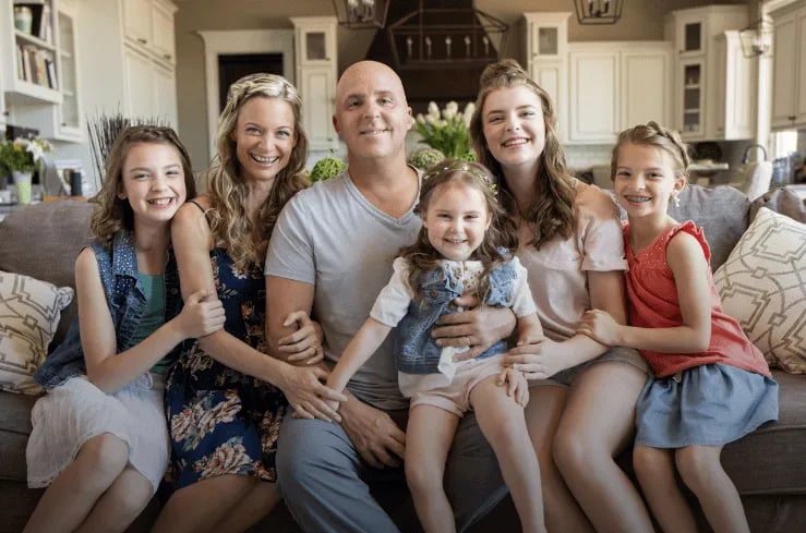 Dr. Patrick Flynn, founder and CEO of The wellness way with his family
