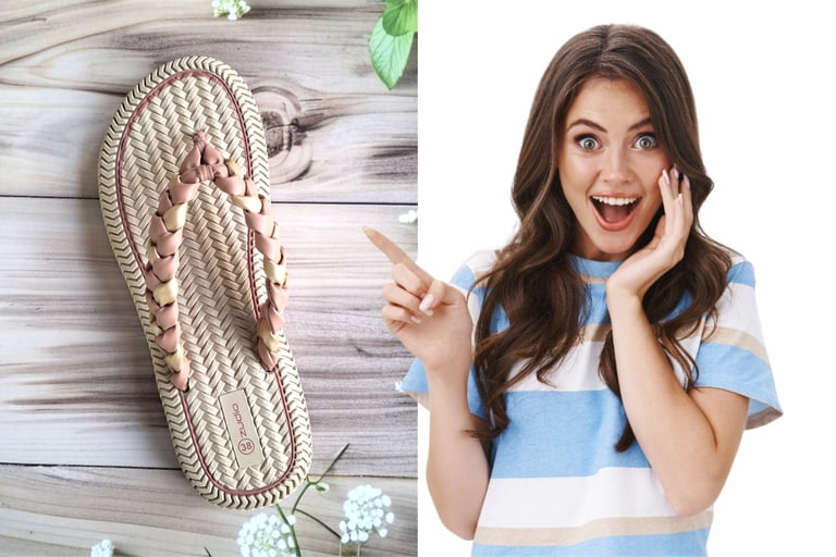 Excited woman pointing at a beige braided flip flop sandal on a wooden background.