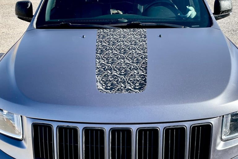 Color change vinyl wrap on a jeep grand cherokee with camo accents in Las Cruces, NM 