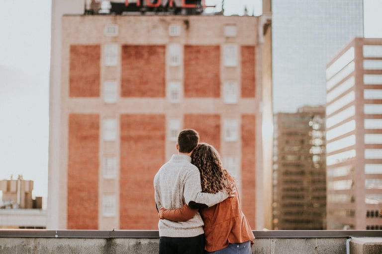 Happy couple looking over Birmingham, AL with Locksmith