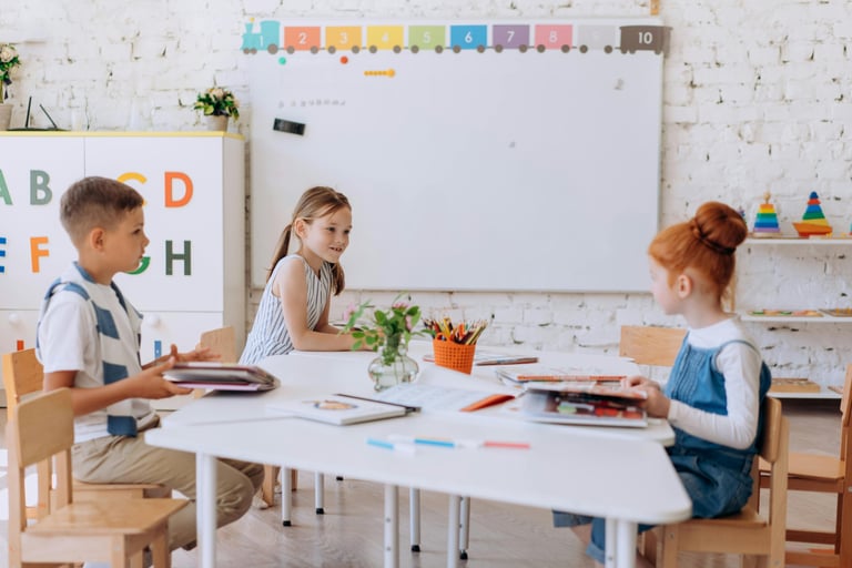Three kids in a classroom