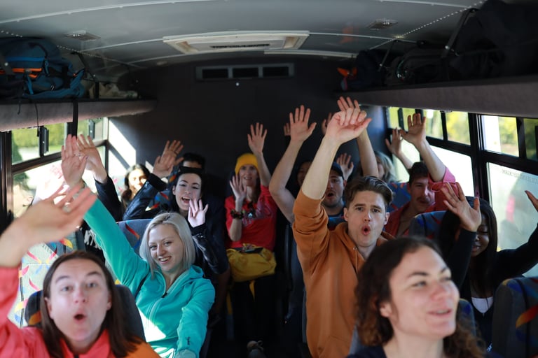 young people party on a charter bus
