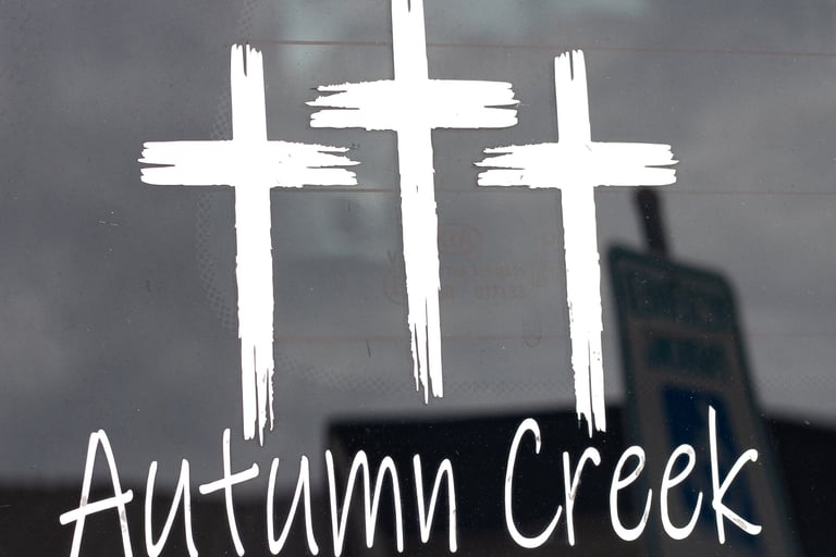 Three crosses with Autumn Creek underneath