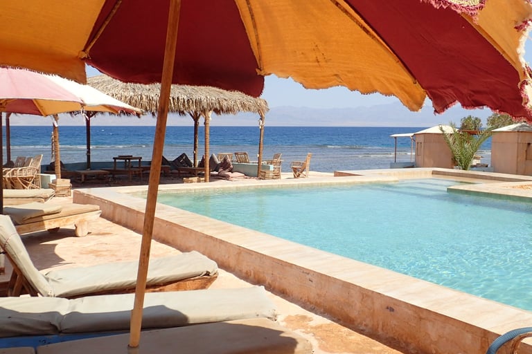 Bedouin star Ras shitan Egypt umbrella pool view