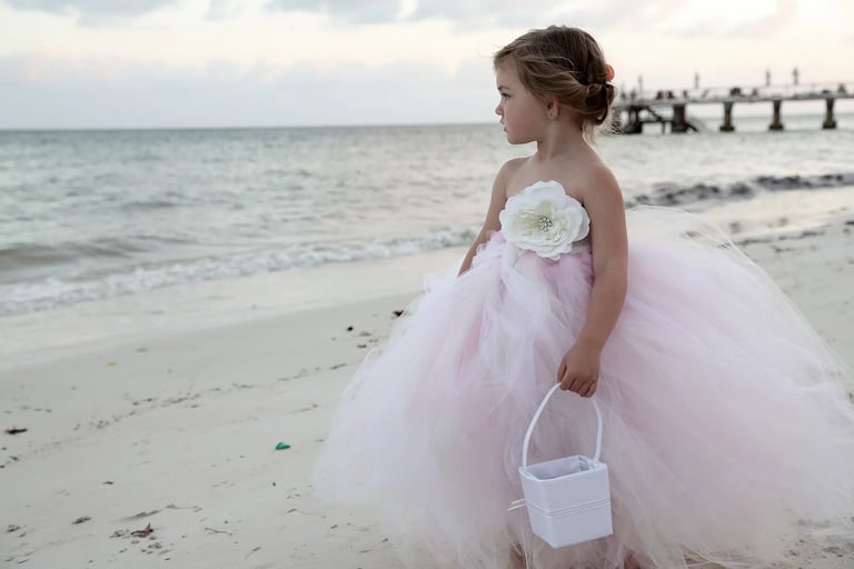 flower girl on the beach in Lighthouse point wedding