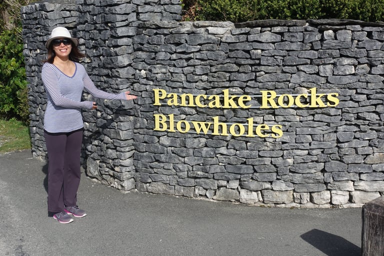 Janet at the Pancake Rocks Sign