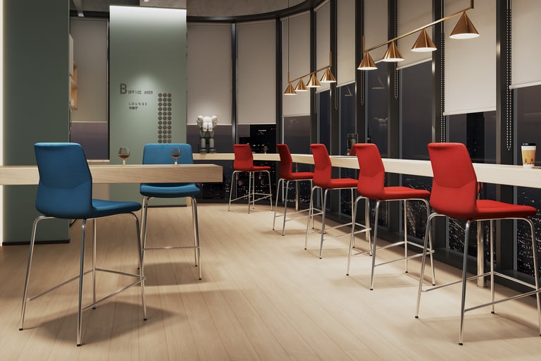 Bar-height blue and red Rita chairs in a modern office lounge with city night view