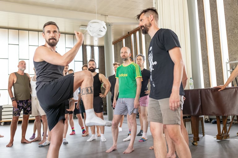 men learning a movement workshop