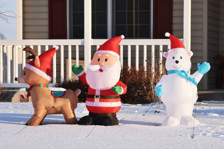 inflatable Santa, reindeer, and bear displays